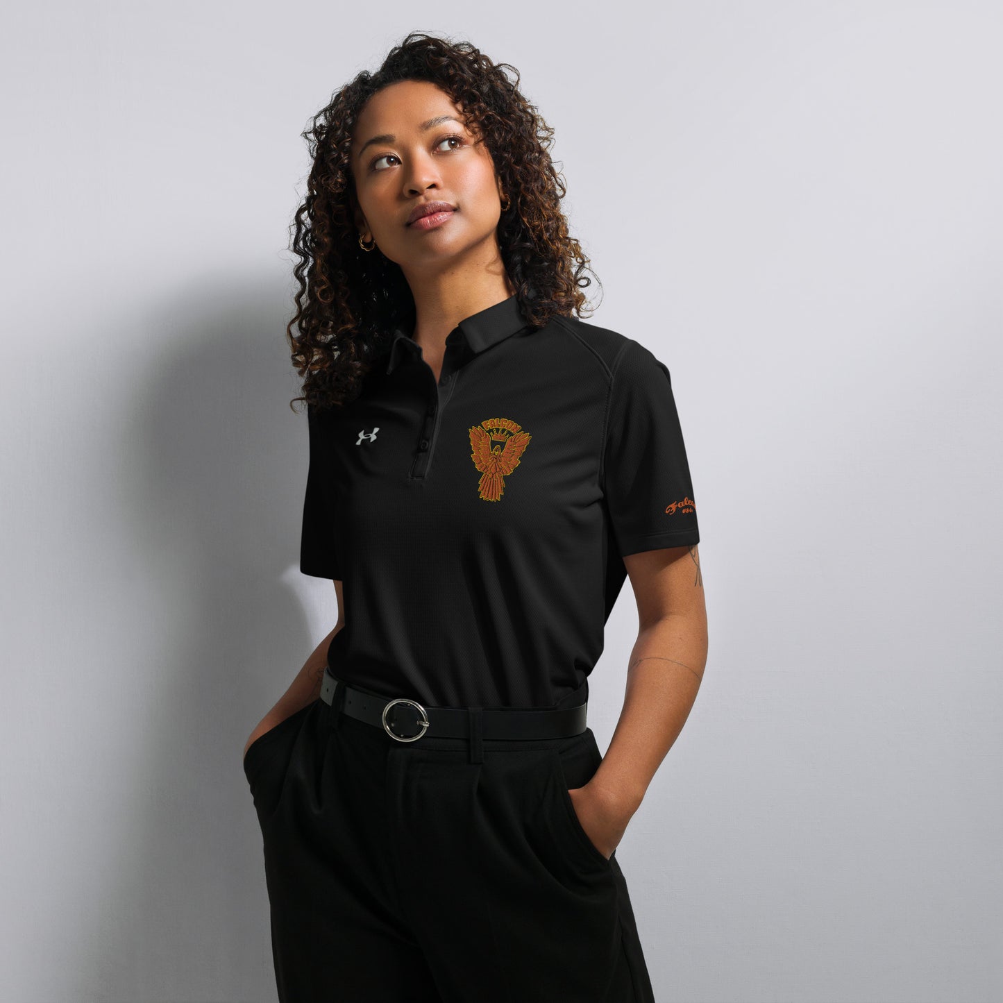Under Armour® Women's polo embroidered Falcon Gold Logo
