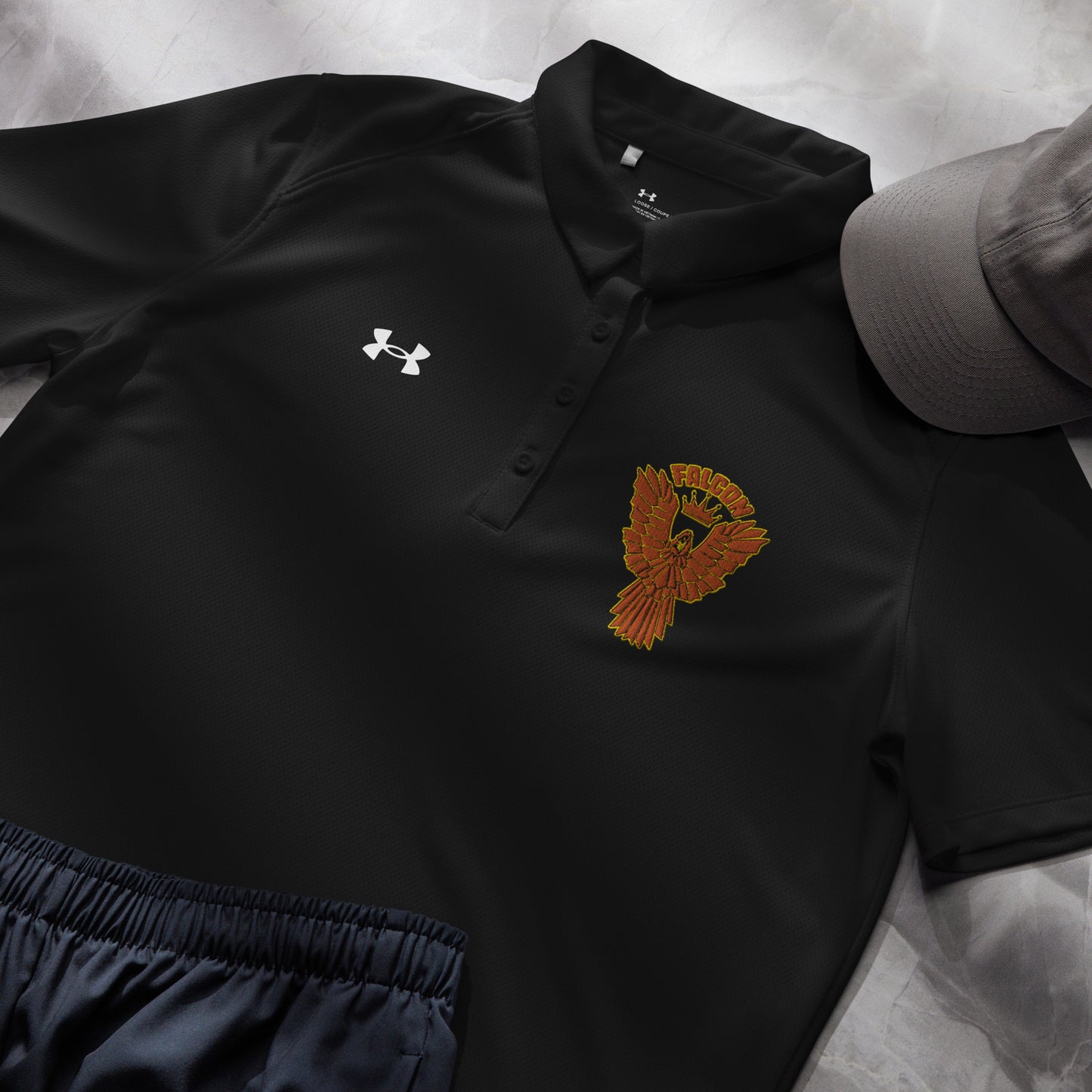 Under Armour® Women's polo embroidered Falcon Gold Logo