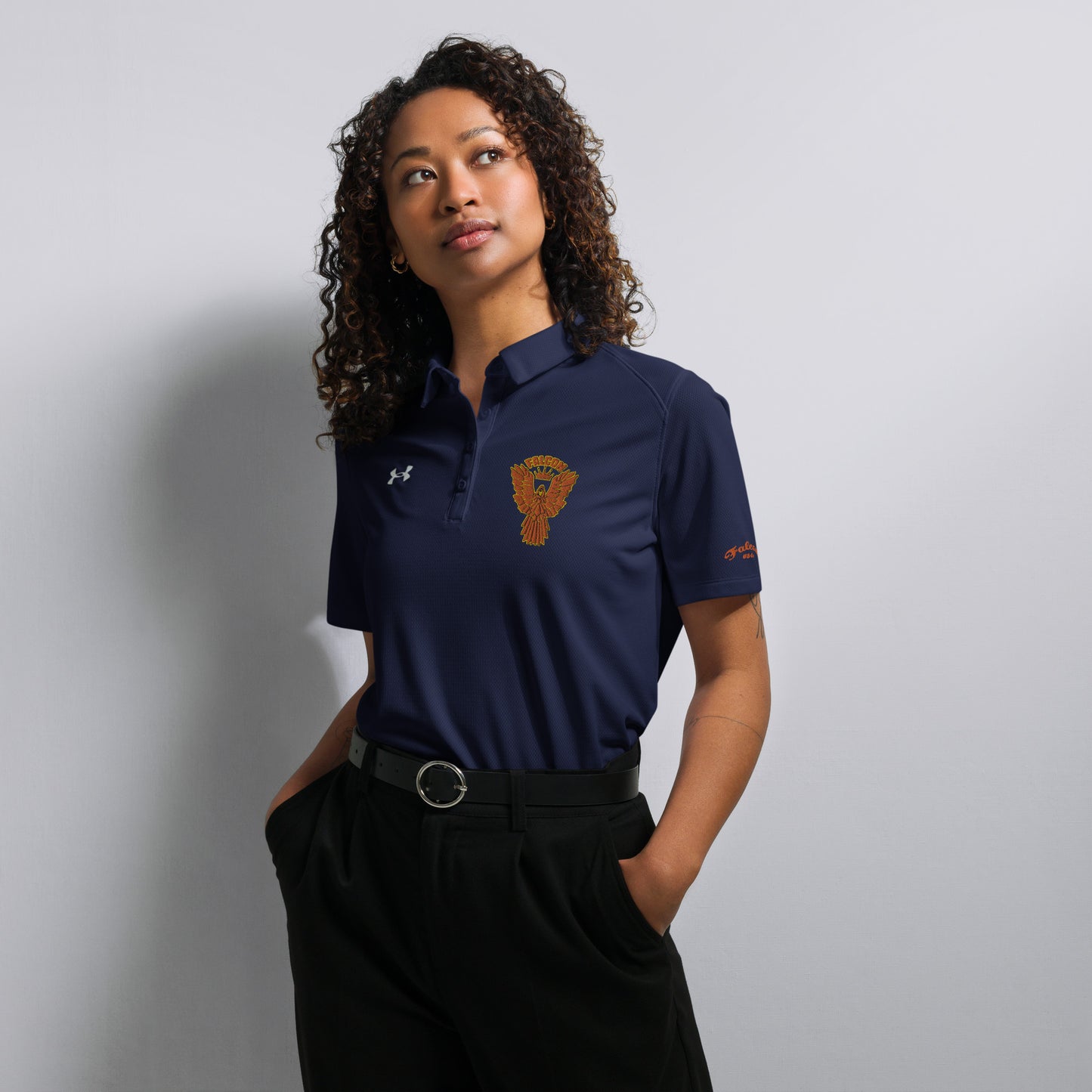 Under Armour® Women's polo embroidered Falcon Gold Logo